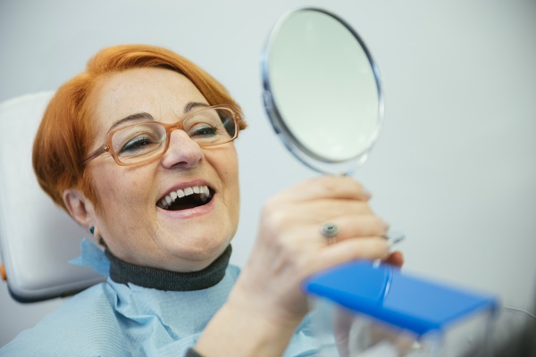 When Would A Dentist Recommend Replacing Old Dentures?